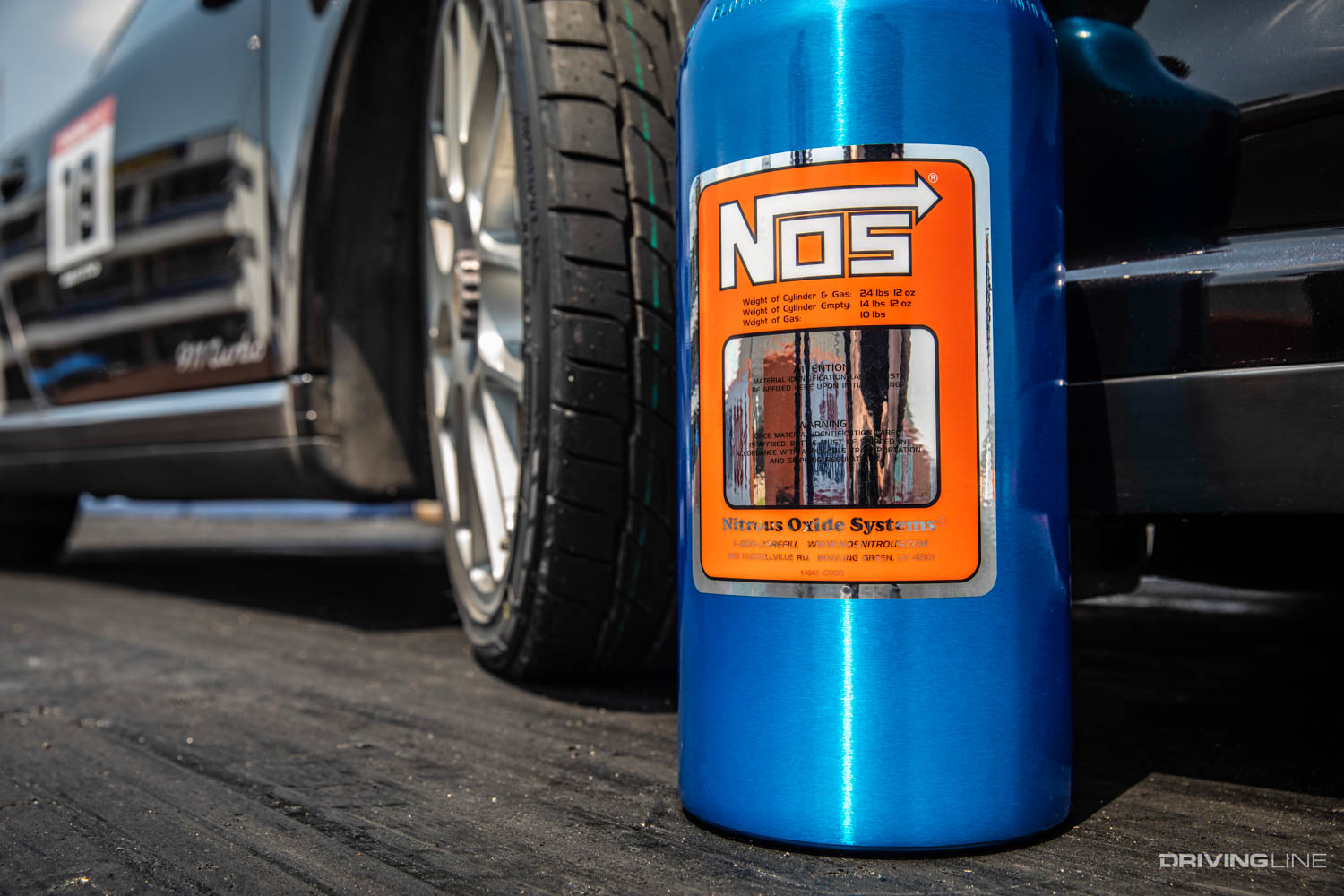 Holley NOS tank next to Nitto NT555 RII tire