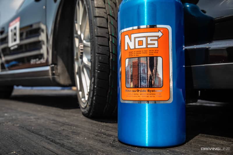 Holley NOS tank next to Nitto NT555 RII tire