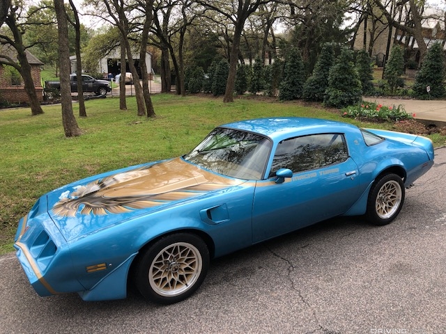 Pontiac Macho T/A in blue in driveway