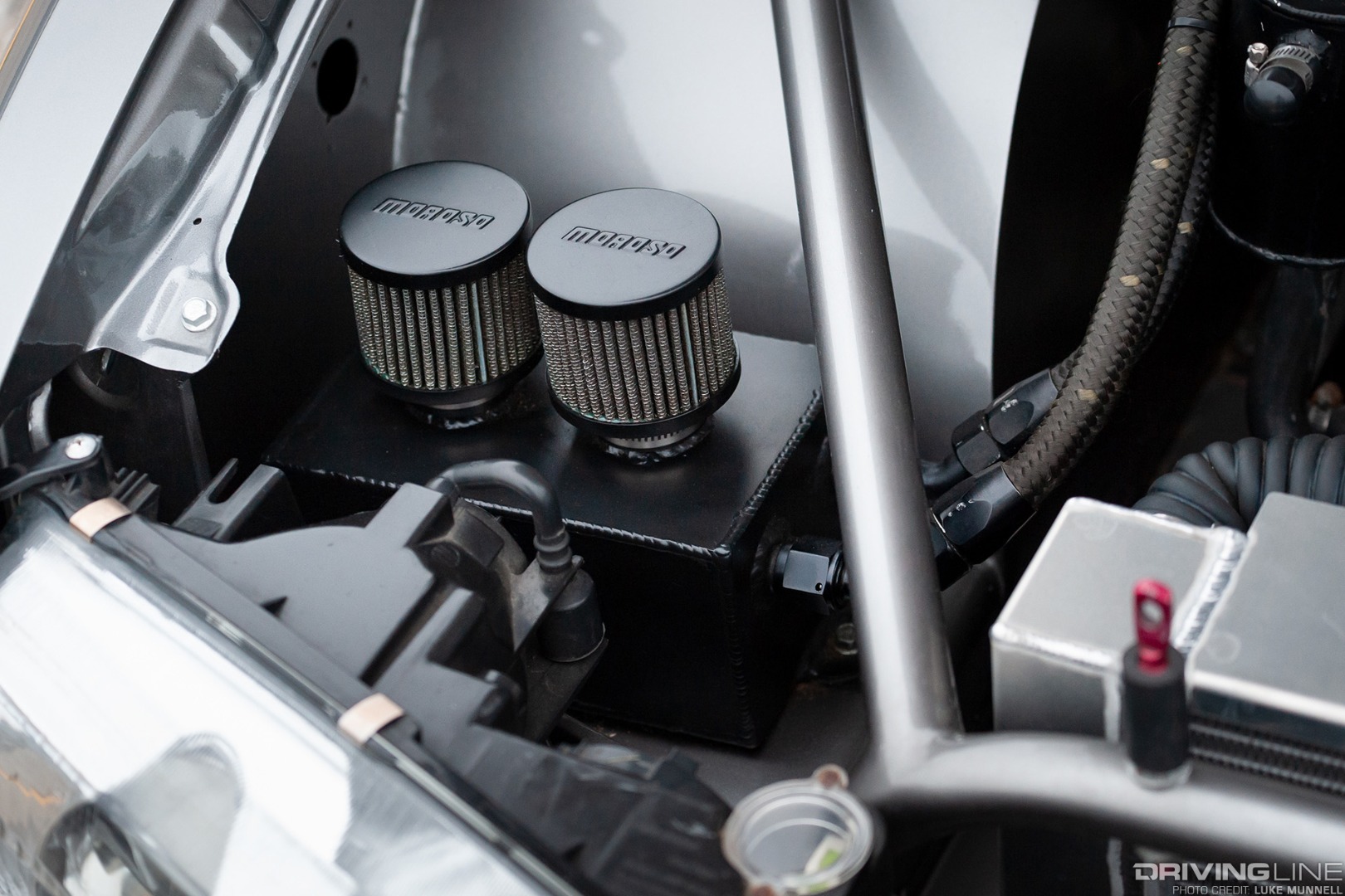 A custom oil catchcan helps catch any oil blowby on Matt Snell's Nissan S14