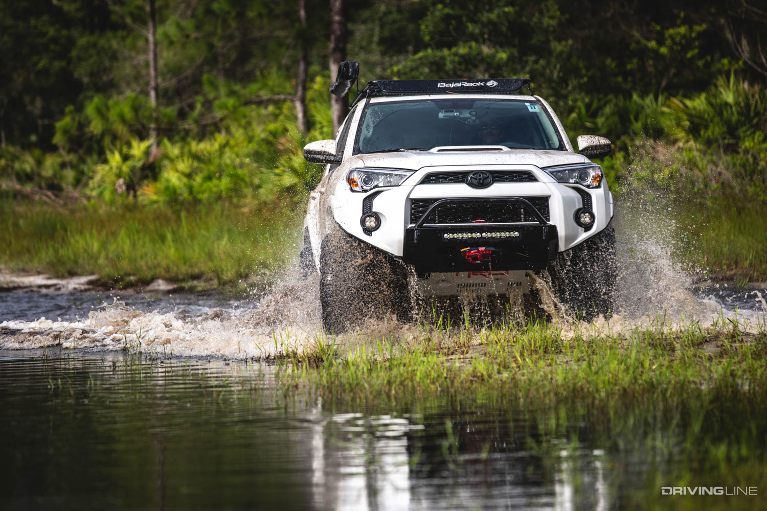 Toyota 4runner on nitto mud grappler tires off roading in Ocala national forest