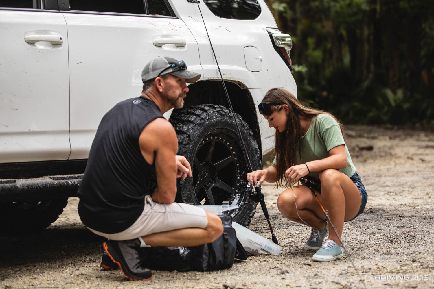 Hannah barron preparing fishing pole in On the Trail Ocala Forest