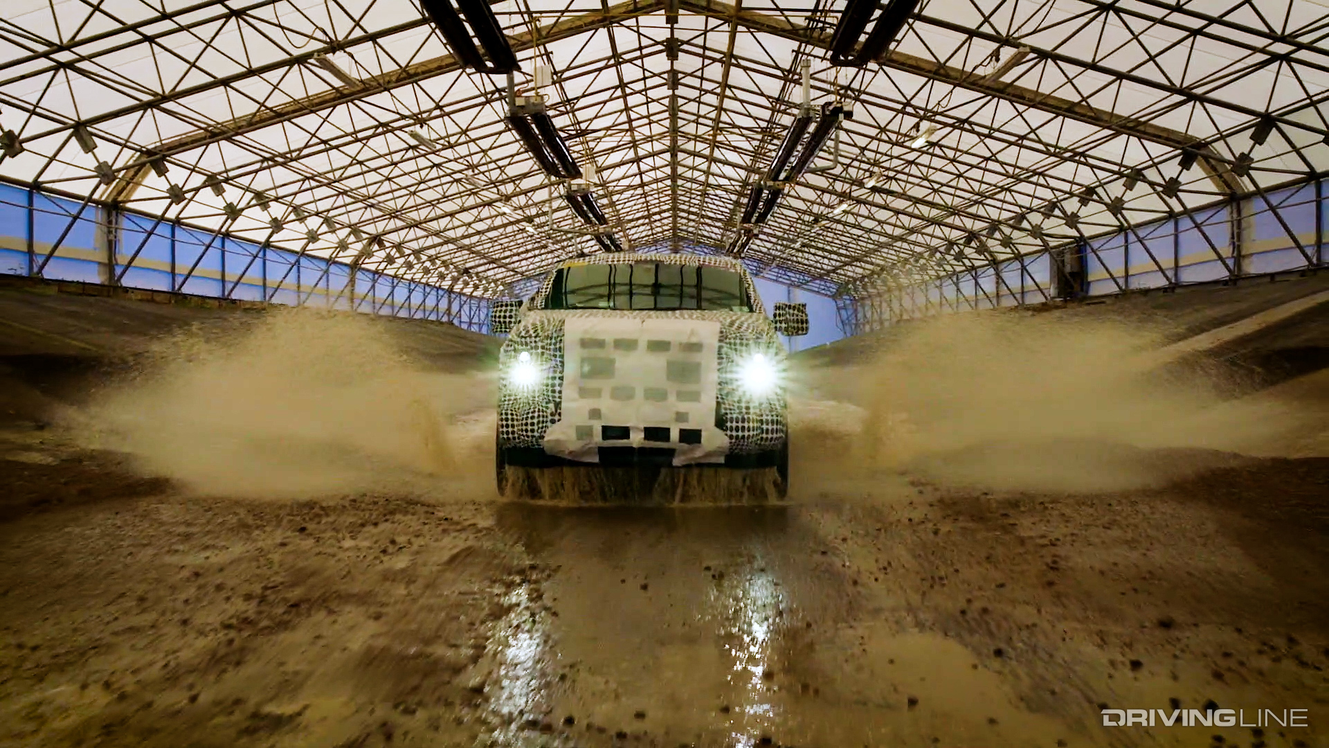 2021 Ford F-150 Hybrid in Camouflage Driving Through Tunnel in Mud and Water