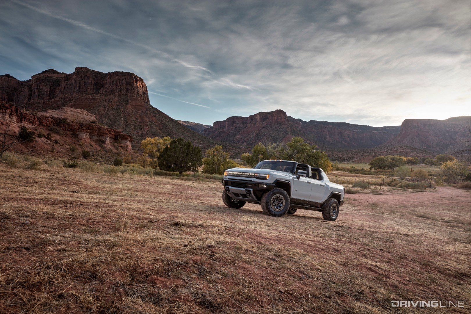 Hummer EV Side In Mountain Pasture