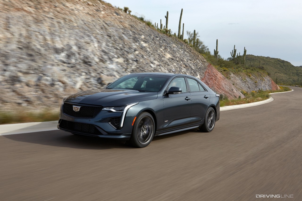 2020 Cadillac CT4-V in motion against rock wall