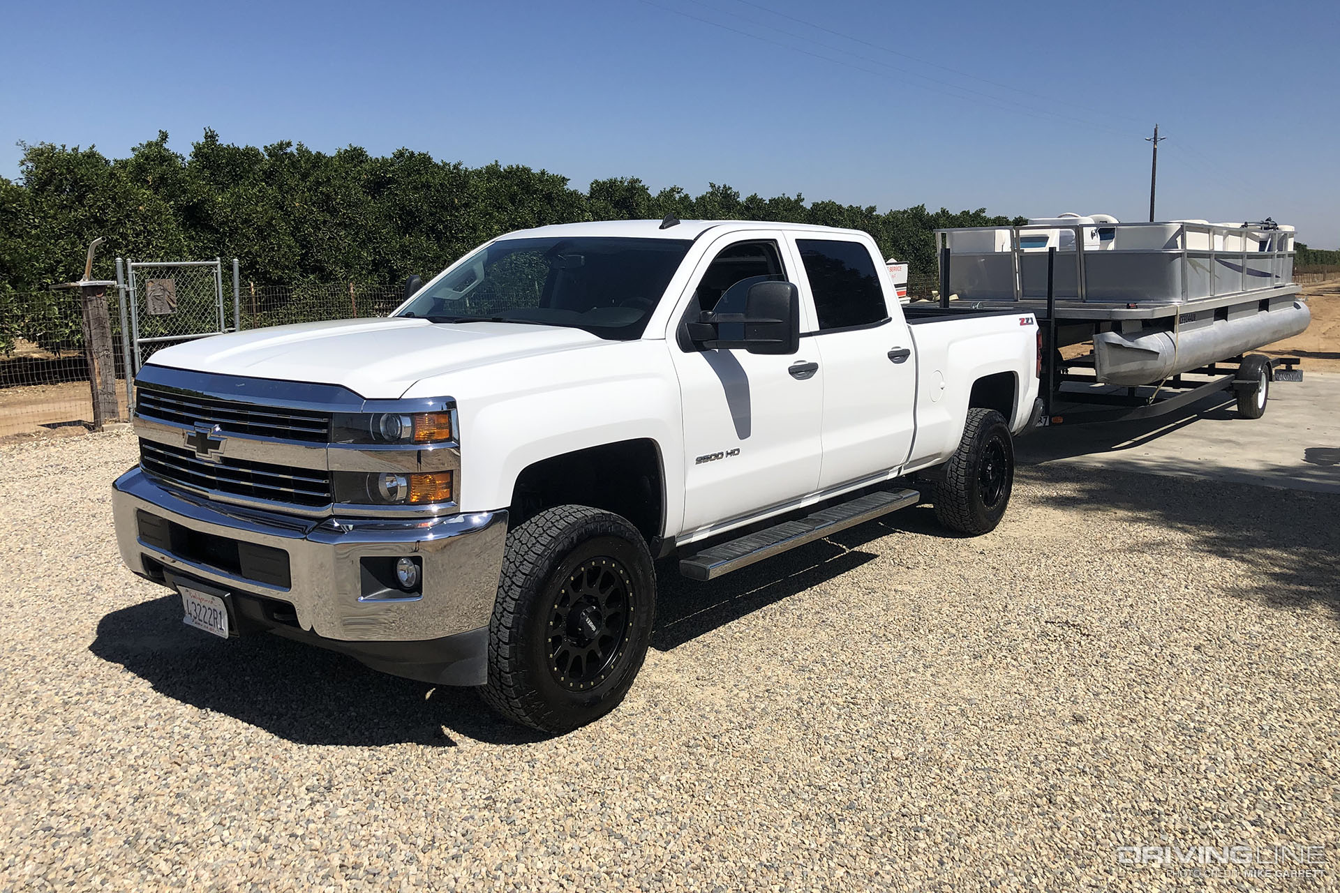 2015 Chevy Silverado 2500 HD on Nitto Terra Grappler G2 Towing Boat