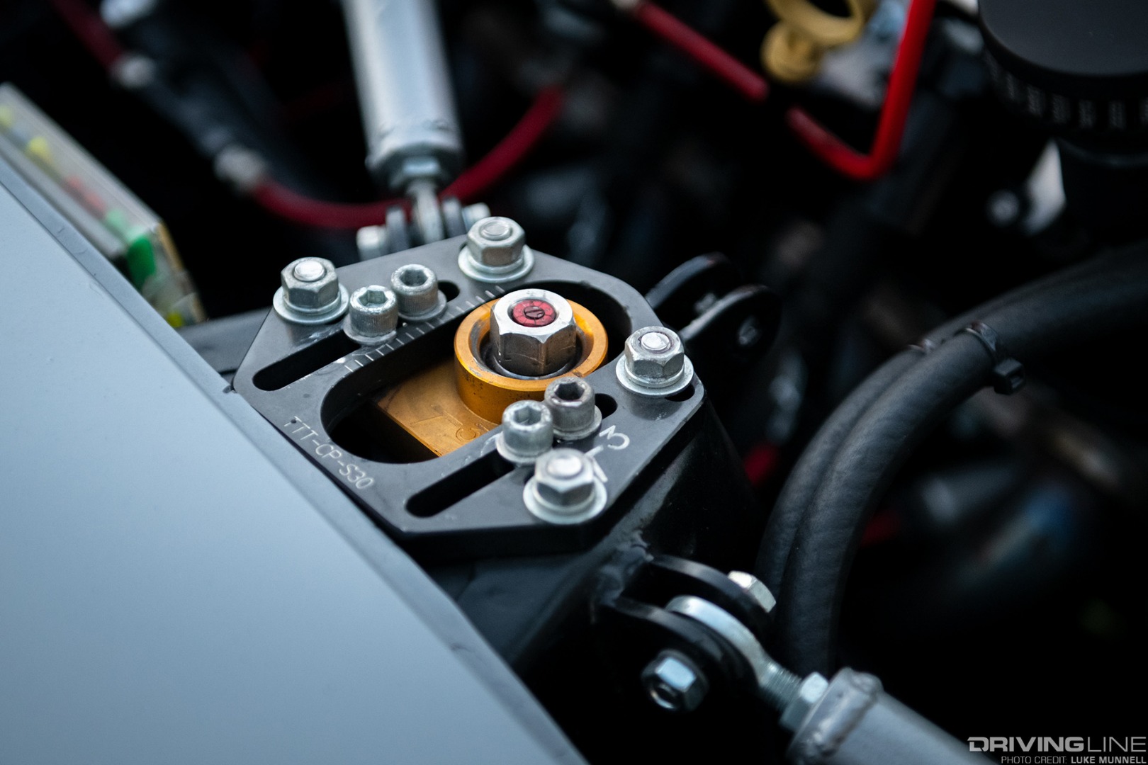 Adjustable camber plates help dial in the suspension settings on Josh Wilson's Datsun 280Z