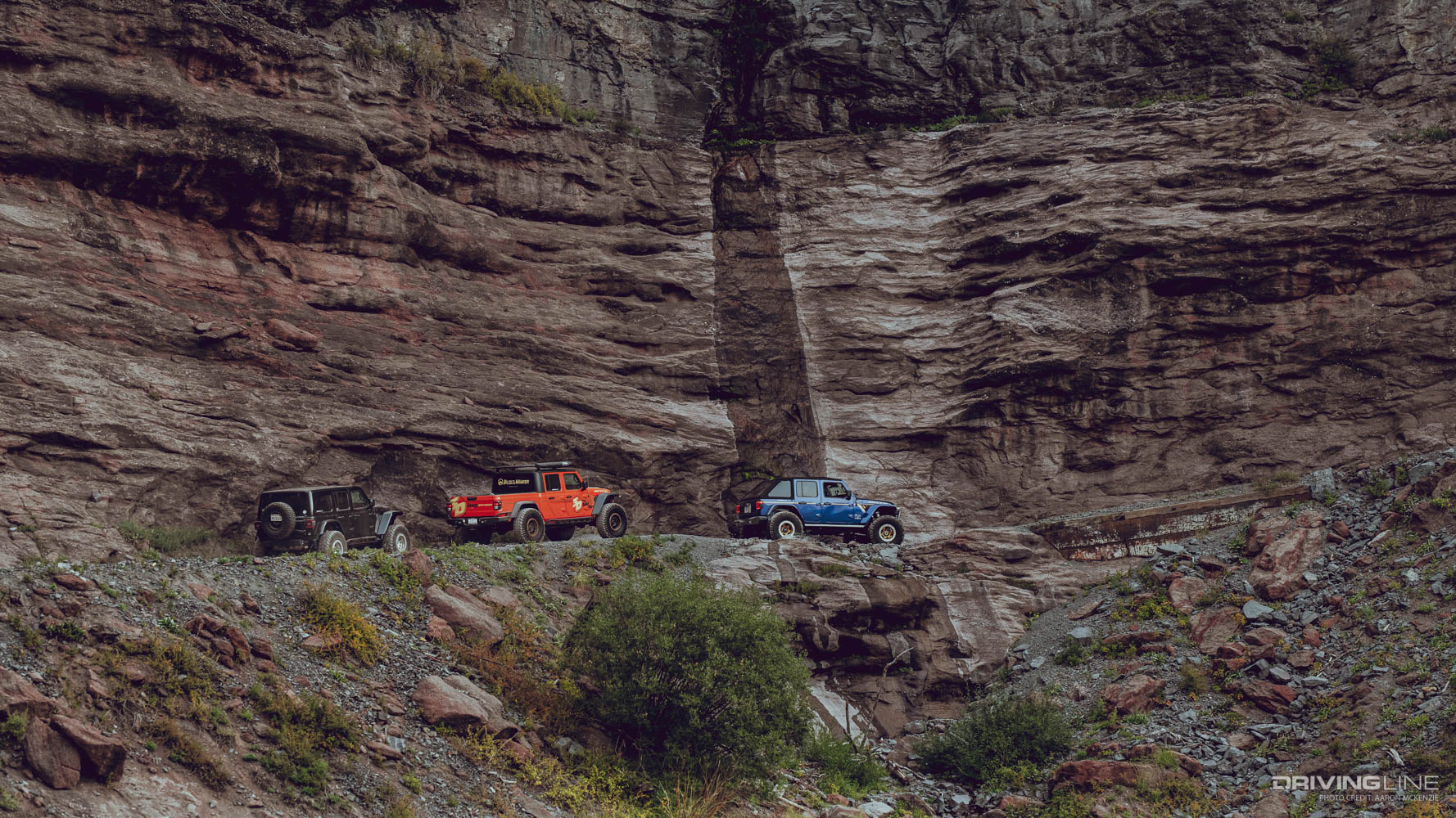 Three jeeps in "On The Trail" driving along Imogene Pass