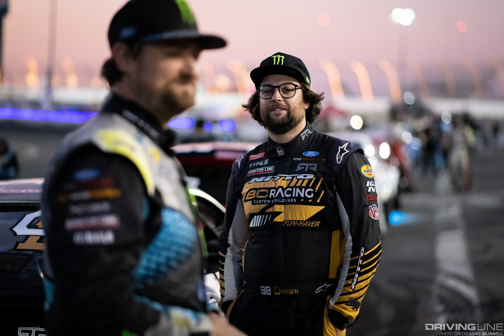 Chelsea Denofa and Vaughn Gittin Jr. await the opening ceremonies at Formula Drift Irwindale