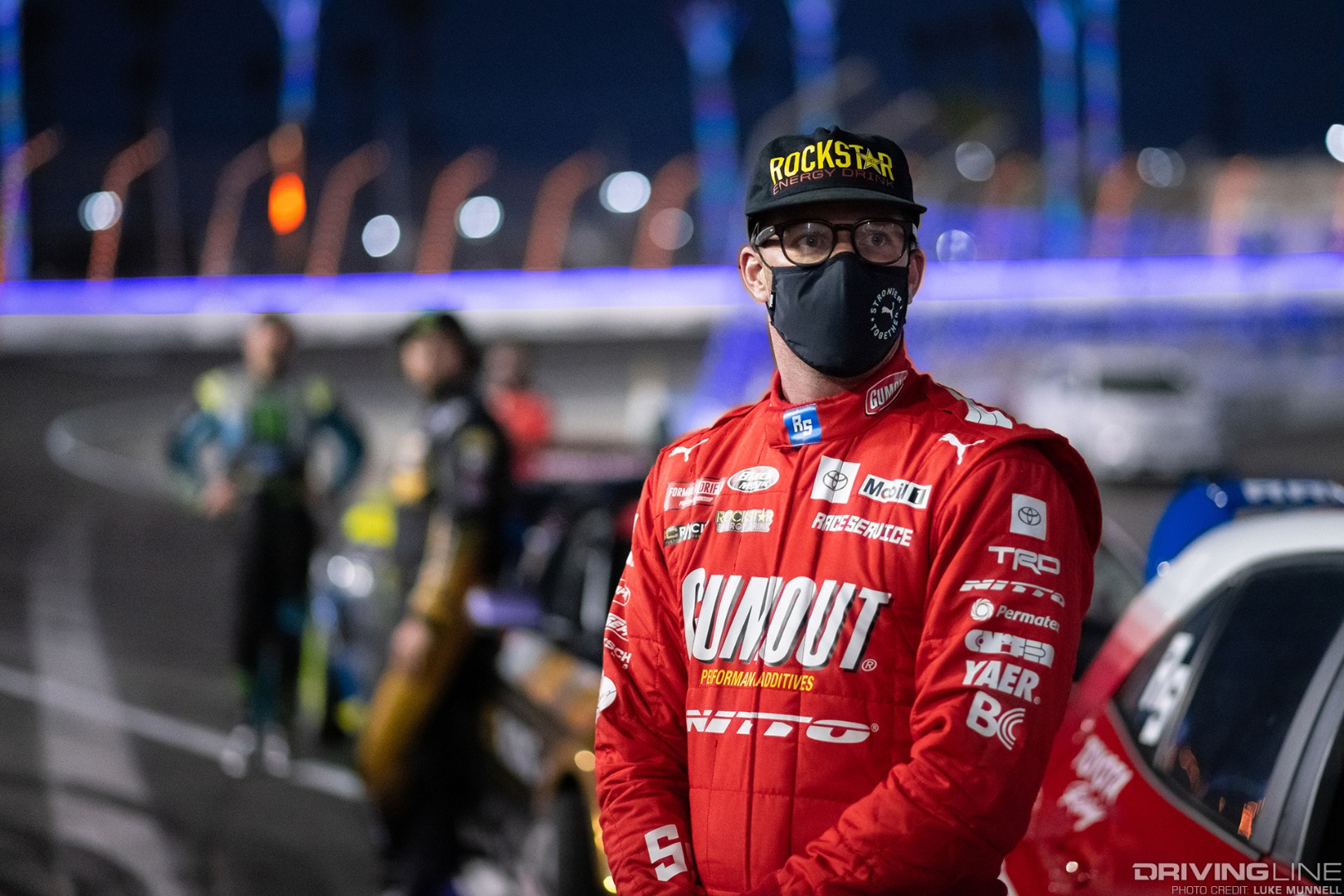 Ryan Tuerck stands outside his Gumout Toyota Corolla ahead of Formula Drift Round 7 at Irwindale