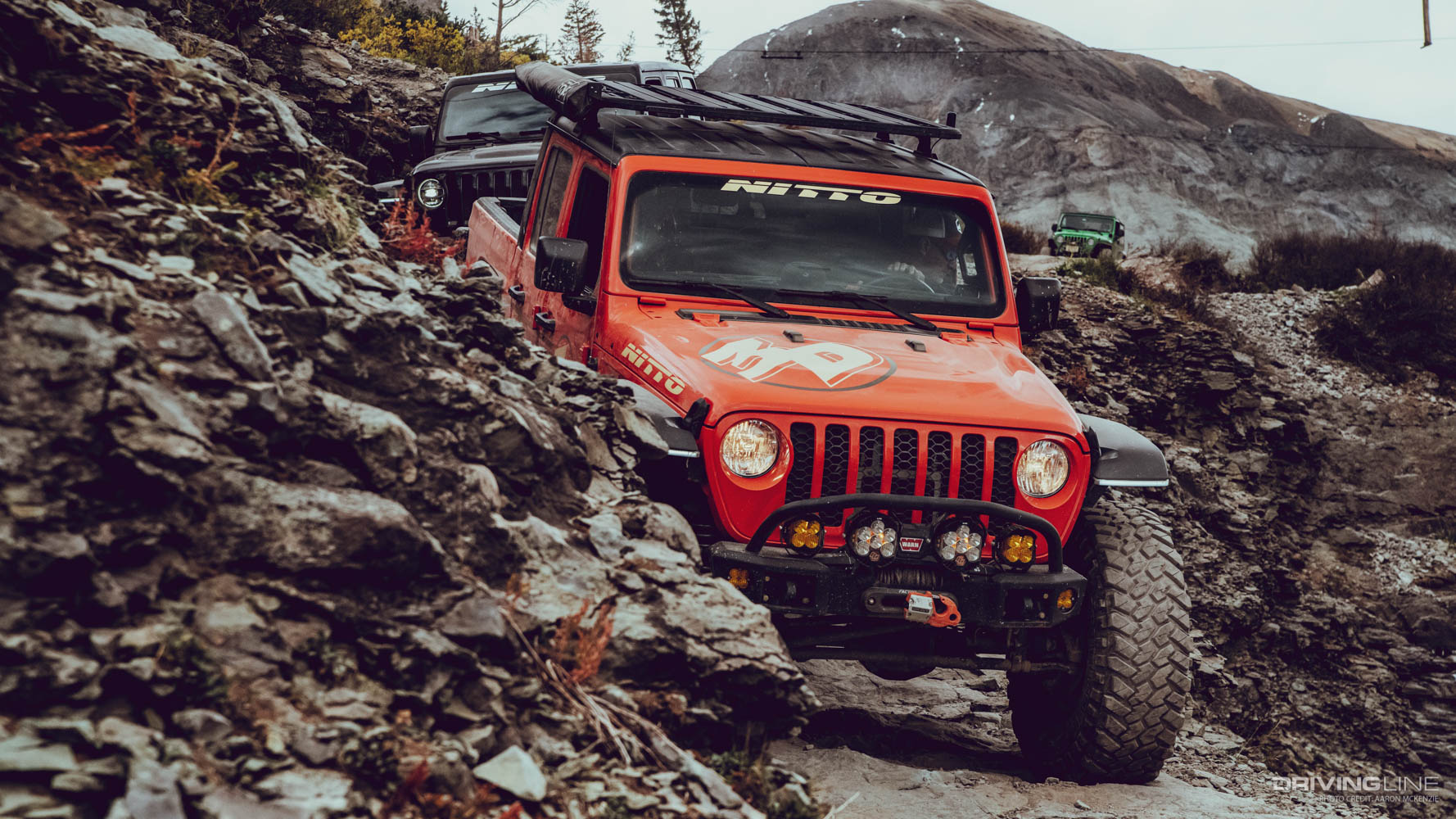 Red Jeep on Trail Grappler Tires