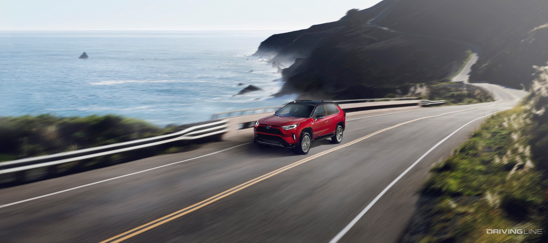 Toyota RAV4 Prime Driving Along Coast