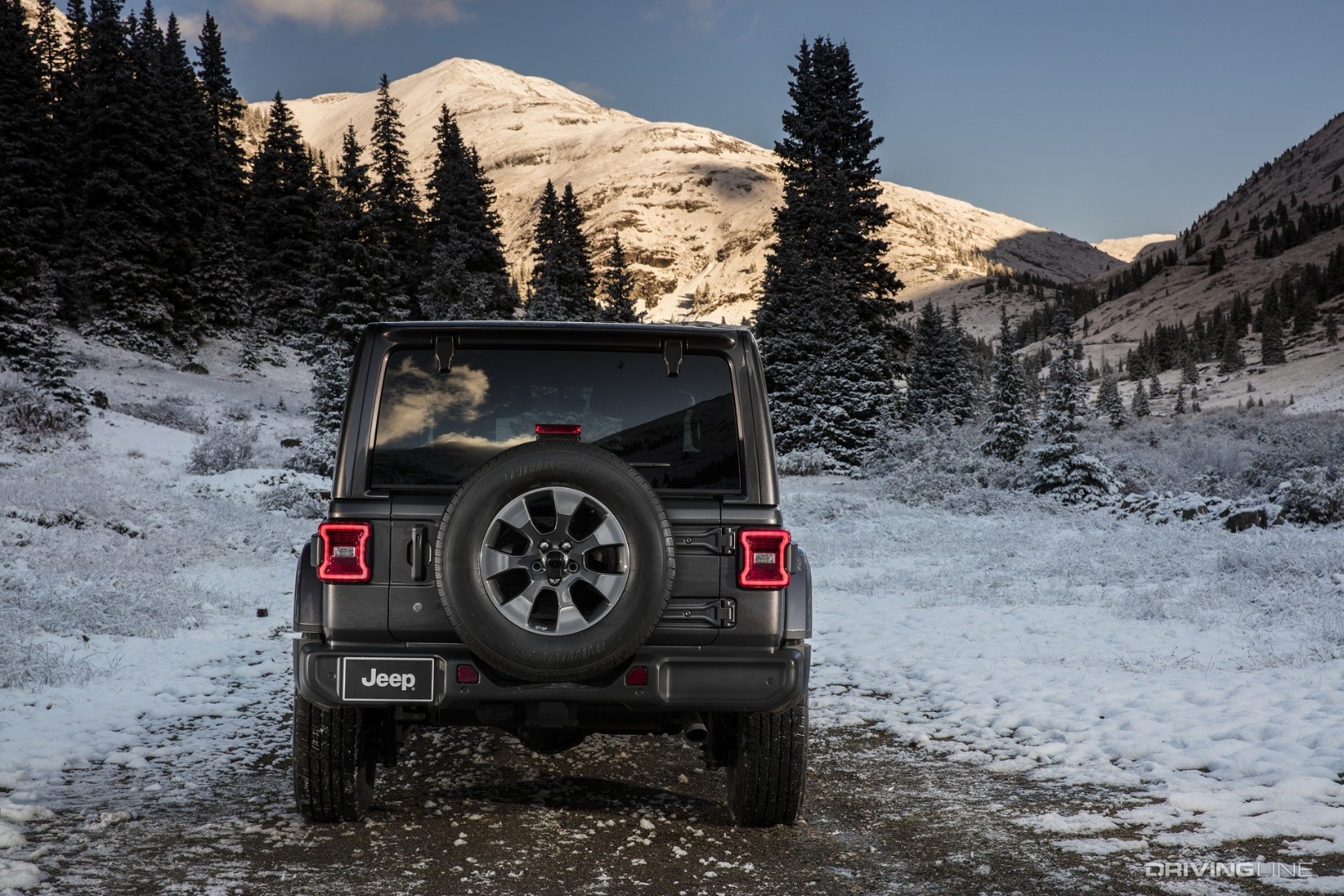 Jeep Wrangler EcoDiesel in snow from behind