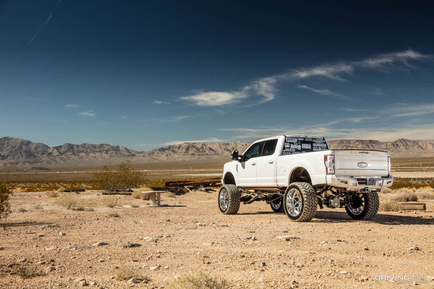 White lifted 2017 Ford Super Duty Truck on 40 inch trail grappler tires