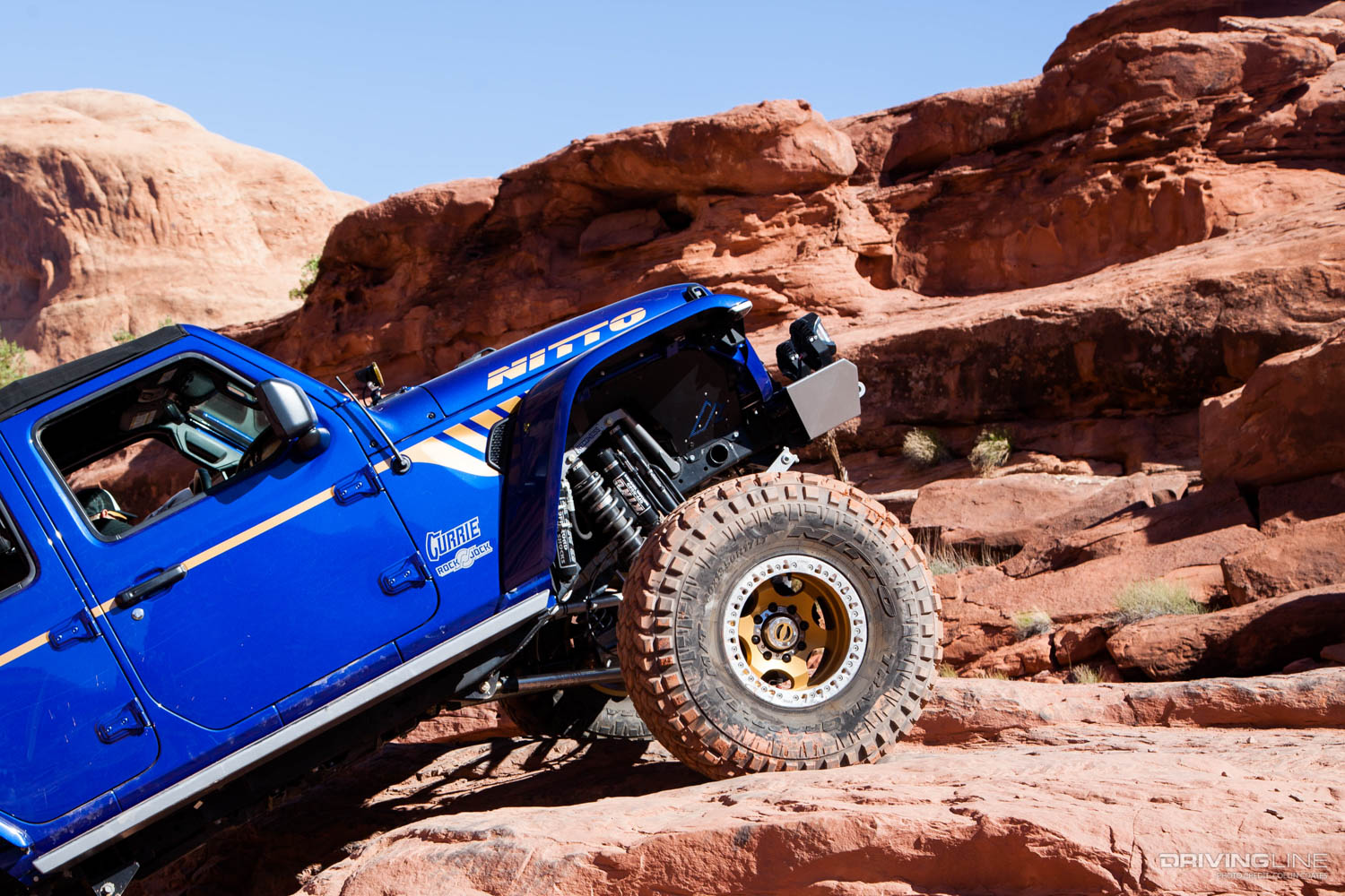 Built 2 wander Collin Coates driving a Jeep