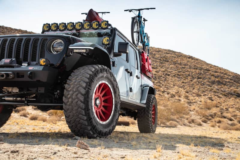 Jeep Gladiator on Nittos in desert with bikes