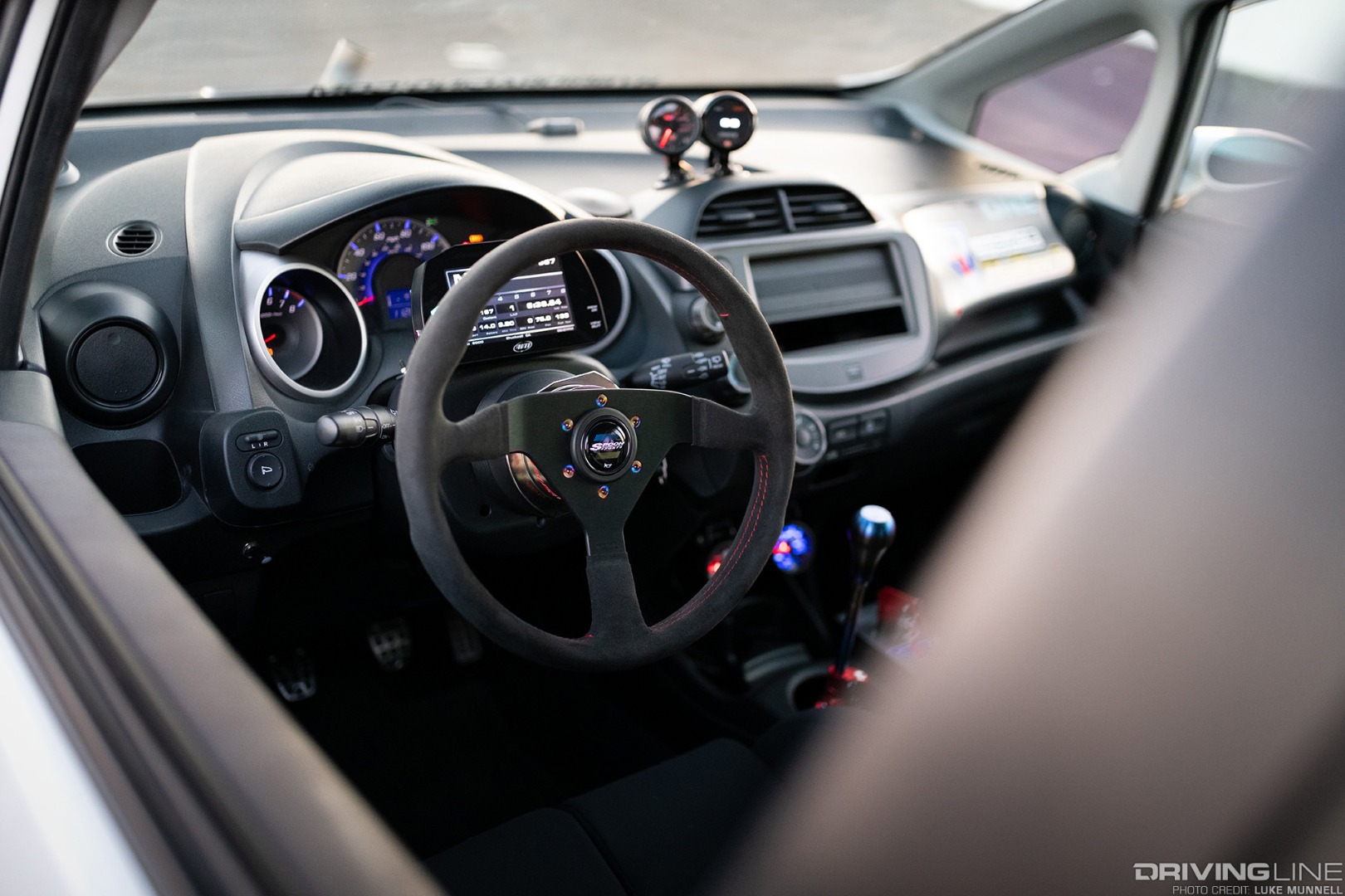 Mario Mojica Nitto Tire NT01 turbocharged Honda Fit interior dash and steering wheel