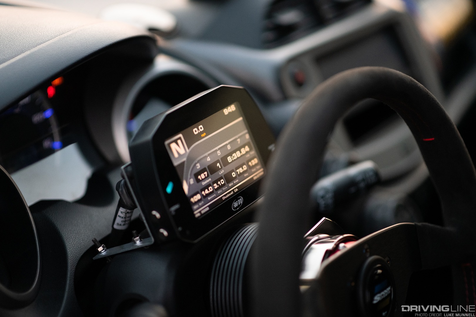 Mario Mojica Nitto Tire NT01 turbocharged Honda Fit closeup of AIM datalogger