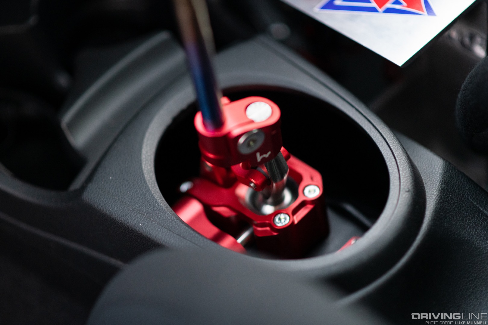 Mario Mojica Nitto Tire NT01 turbocharged Honda Fit closeup of Hybrid Racing shifter