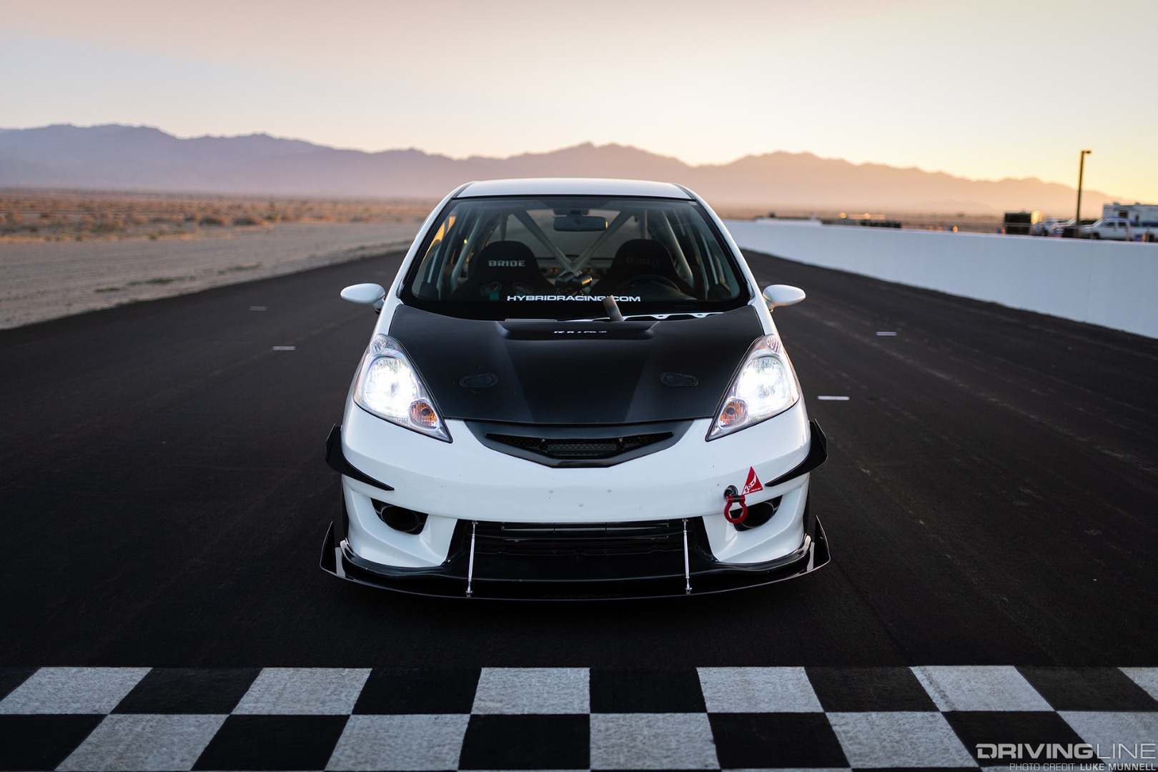 Mario Mojica Nitto Tire NT01 turbocharged Honda Fit front overhead static at checkered line