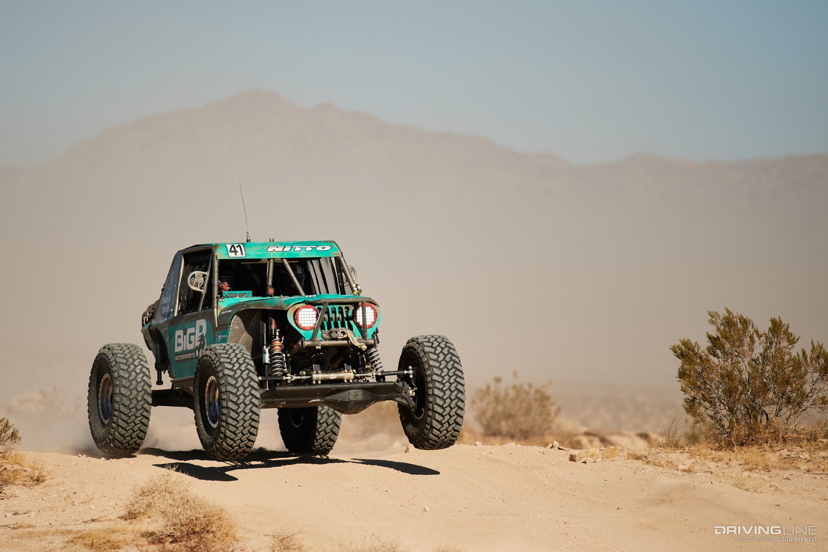 Josh Blyler driving through the desert