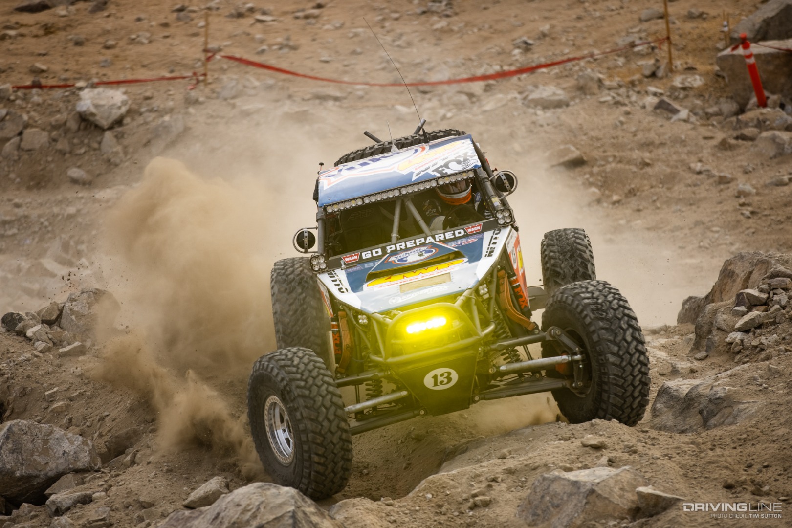 Bailey Cole kicking up dirt in loose rocks
