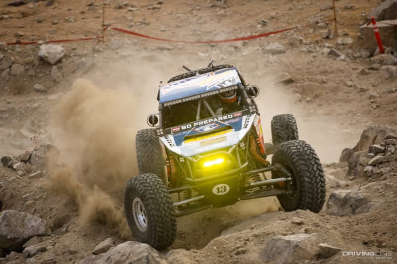 Bailey Cole kicking up dirt in loose rocks