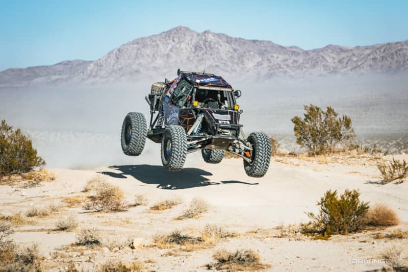 JP Gomez's rig in the air going over a berm