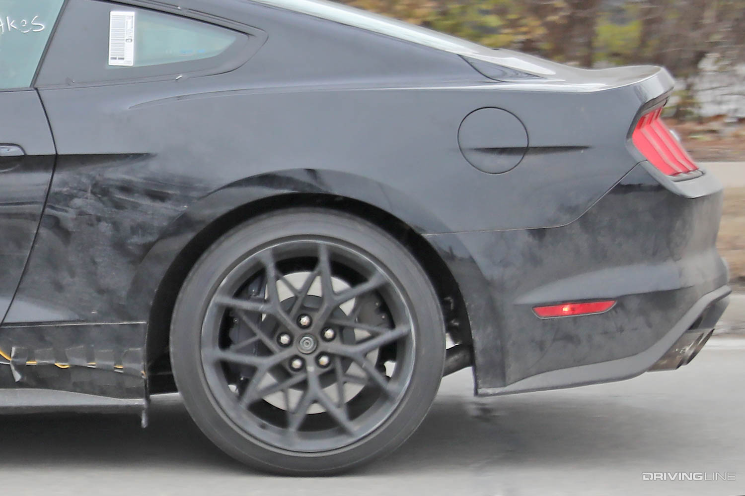 rear wheel detail spy photos of new 2023 Ford Mustang GT