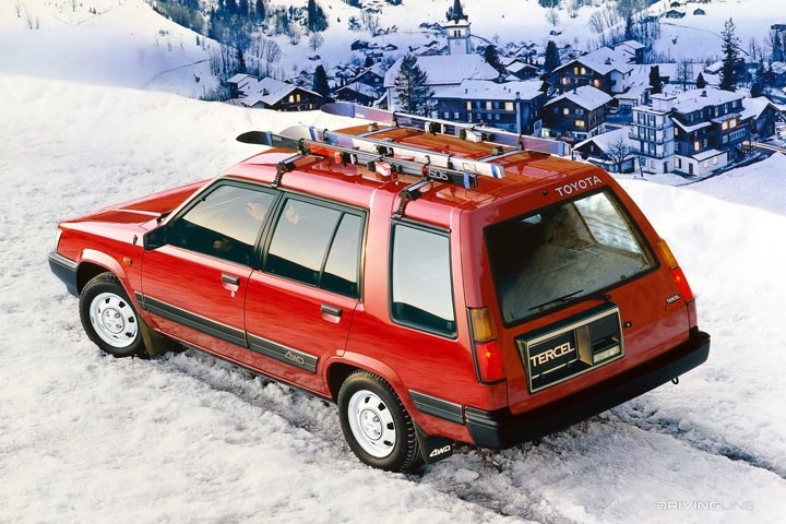 Toyota Tercel 4WD overlooking town in snow