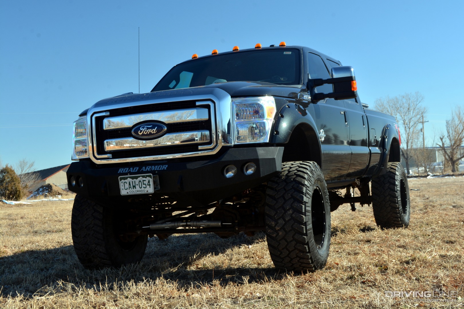 Lifted 2011 Ford F350 front 3/4 full