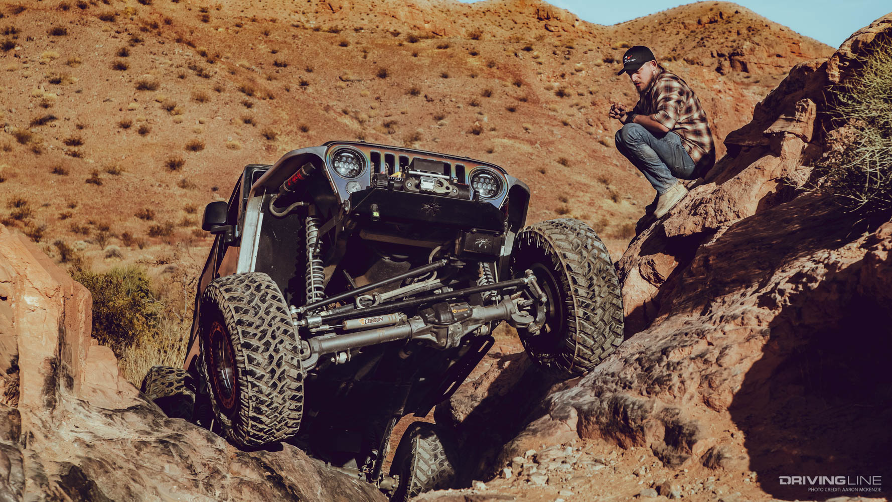 Austin Stobaugh spotting for a jeep off road