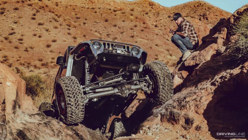 Austin Stobaugh spotting for a jeep off road