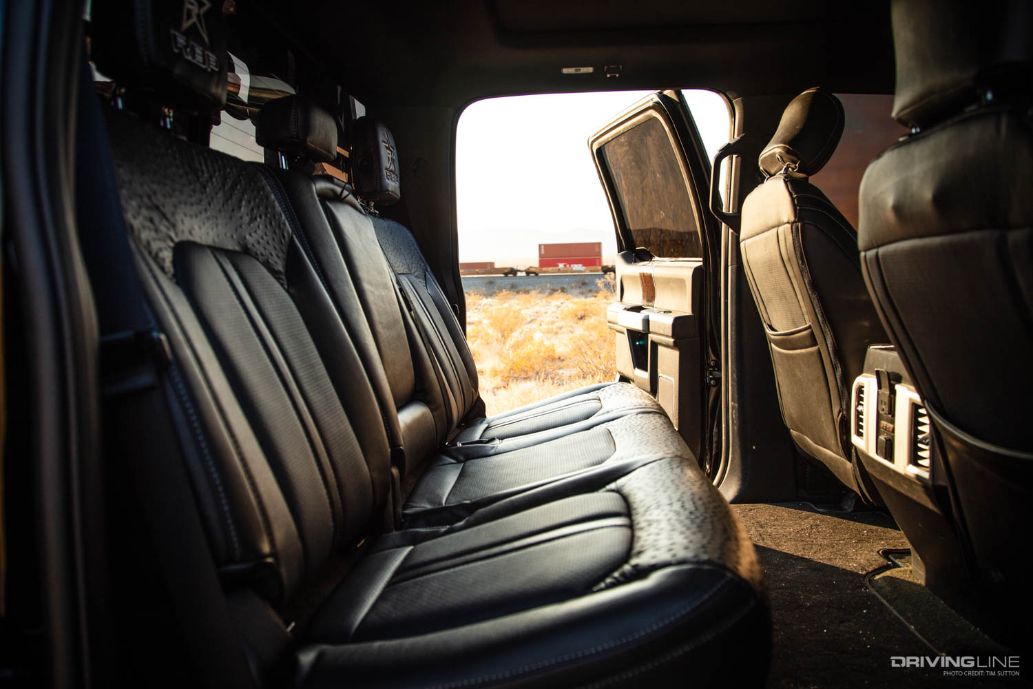 Rear seats of custom F350 Dually Flatbed on Nitto Trail Grappler Tires