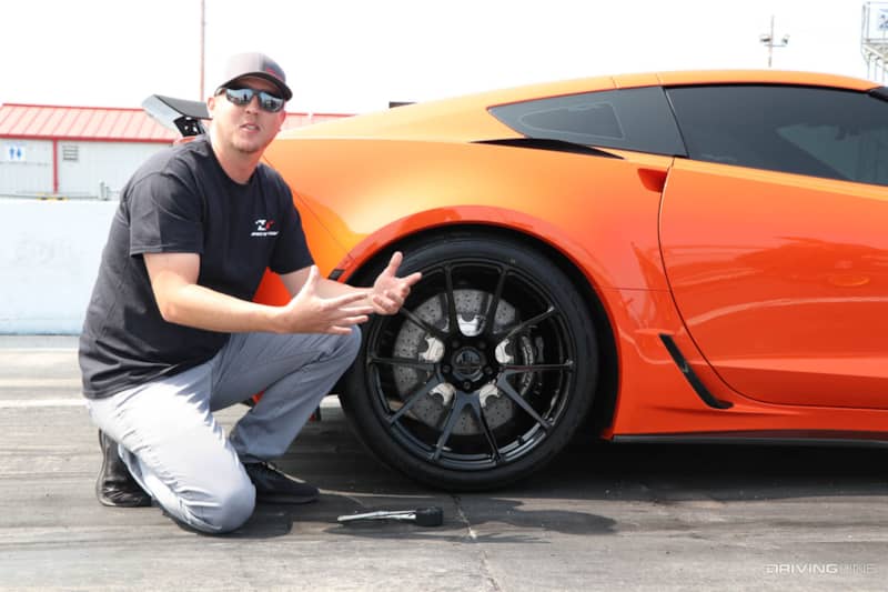 Justin Keith talking next to Corvette with Nitto NT555RII Drag Radial tires