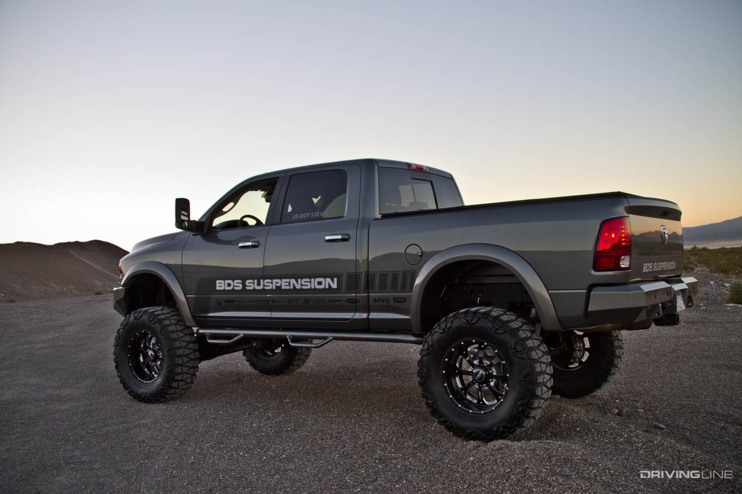 Driver side rear of 2013 Ram 3500 on 40" Nitto Mud Grappler Tires