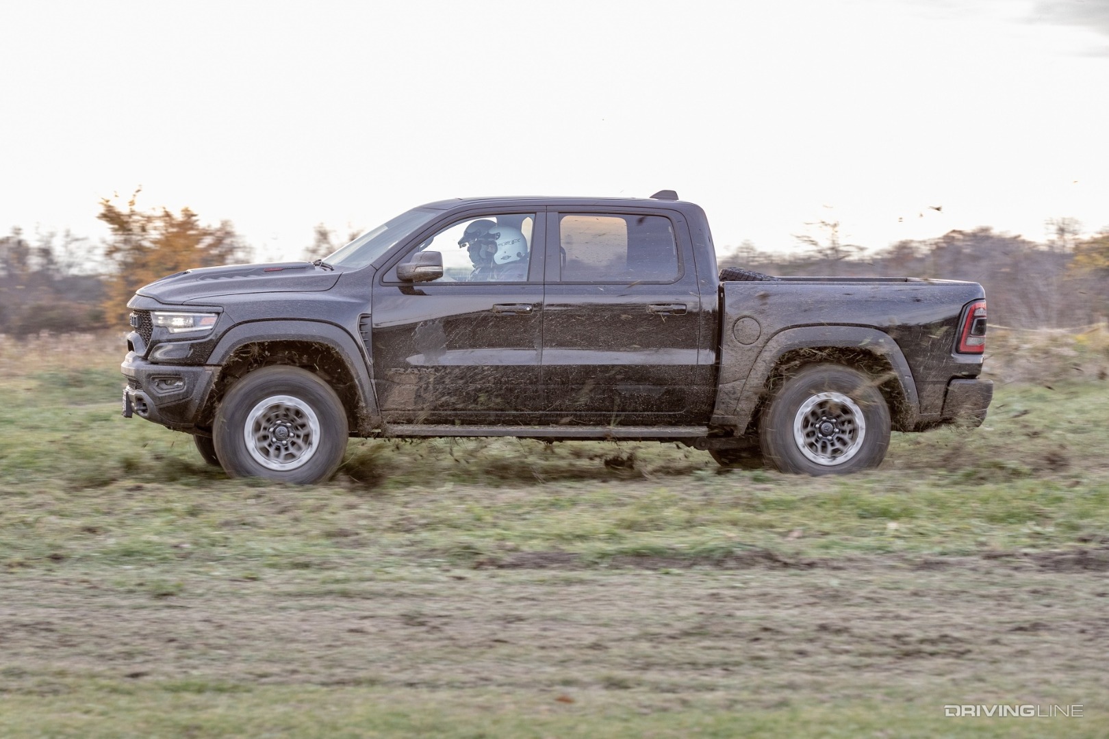 Ram TRX side view in the mud