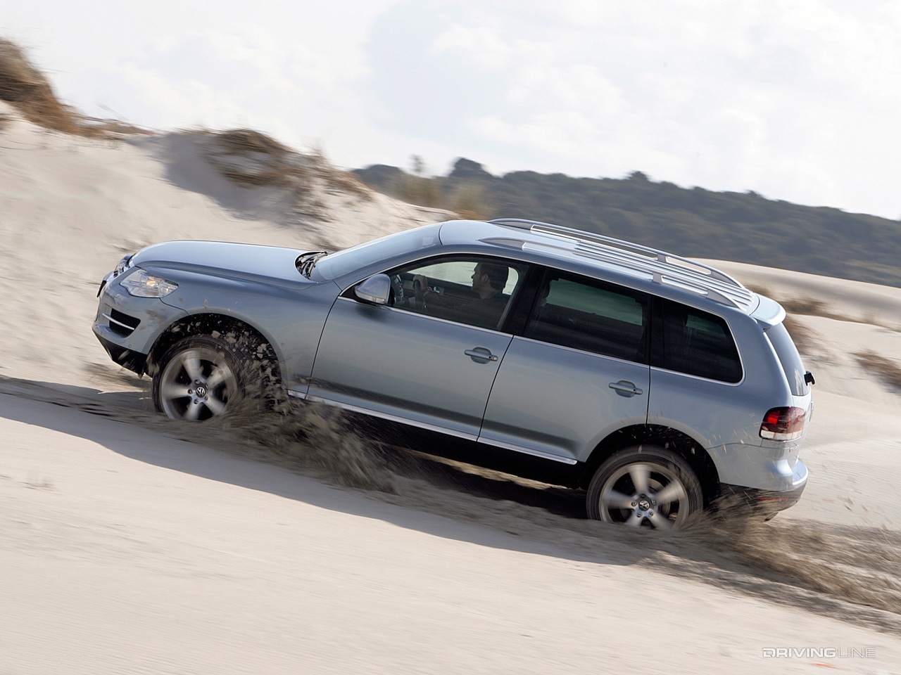 Volkswagen Touareg desert running through sand