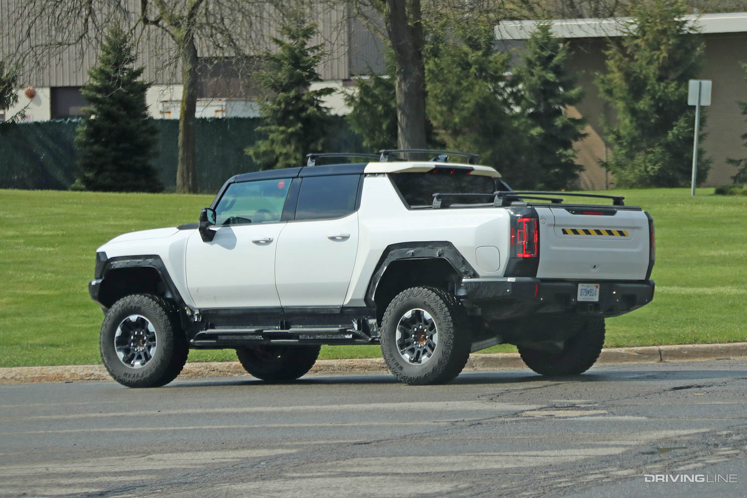 2022 GMC Hummer with accessory roof and bed racks spy photos