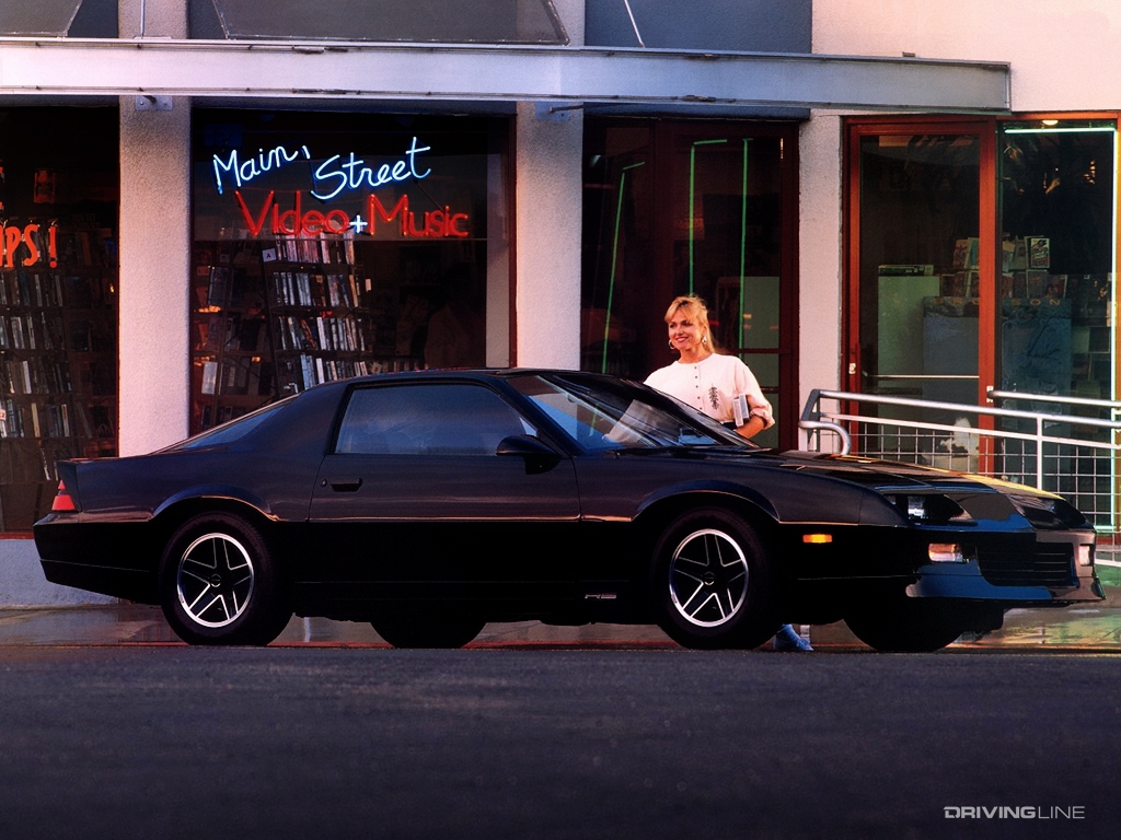 Chevrolet Camaro in front of music store