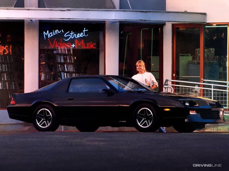 Chevrolet Camaro in front of music store
