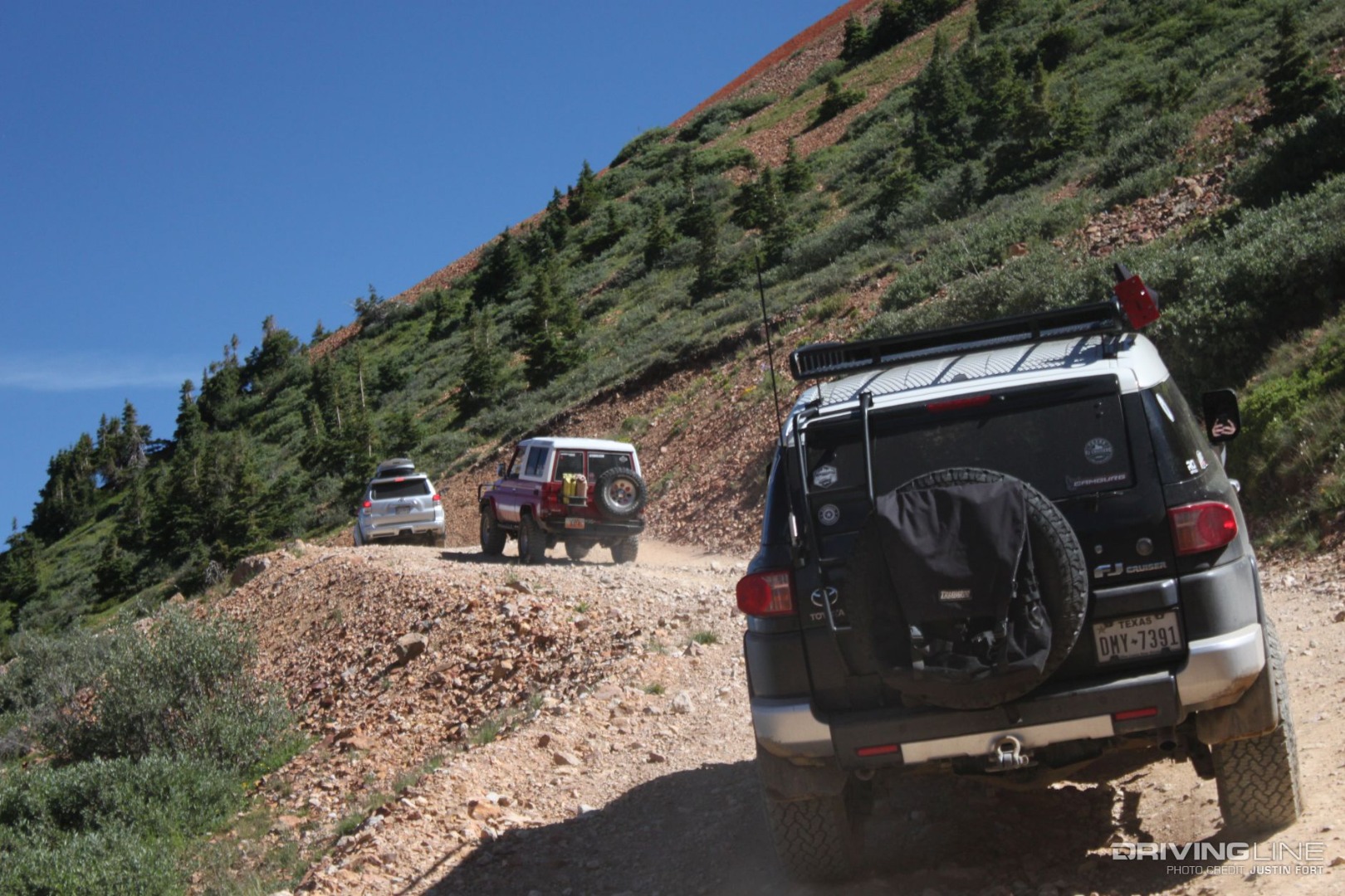 Toyota FJ Cruiser on the trail with other SUVs