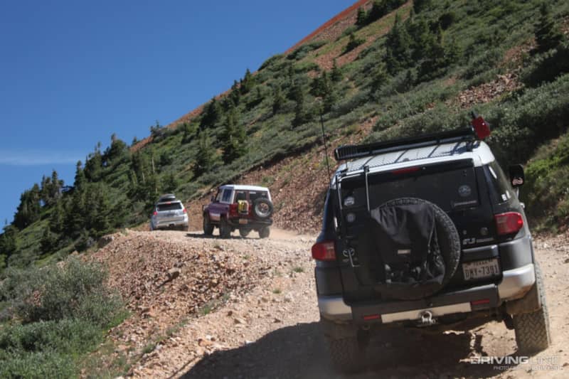 Toyota FJ Cruiser on the trail with other SUVs