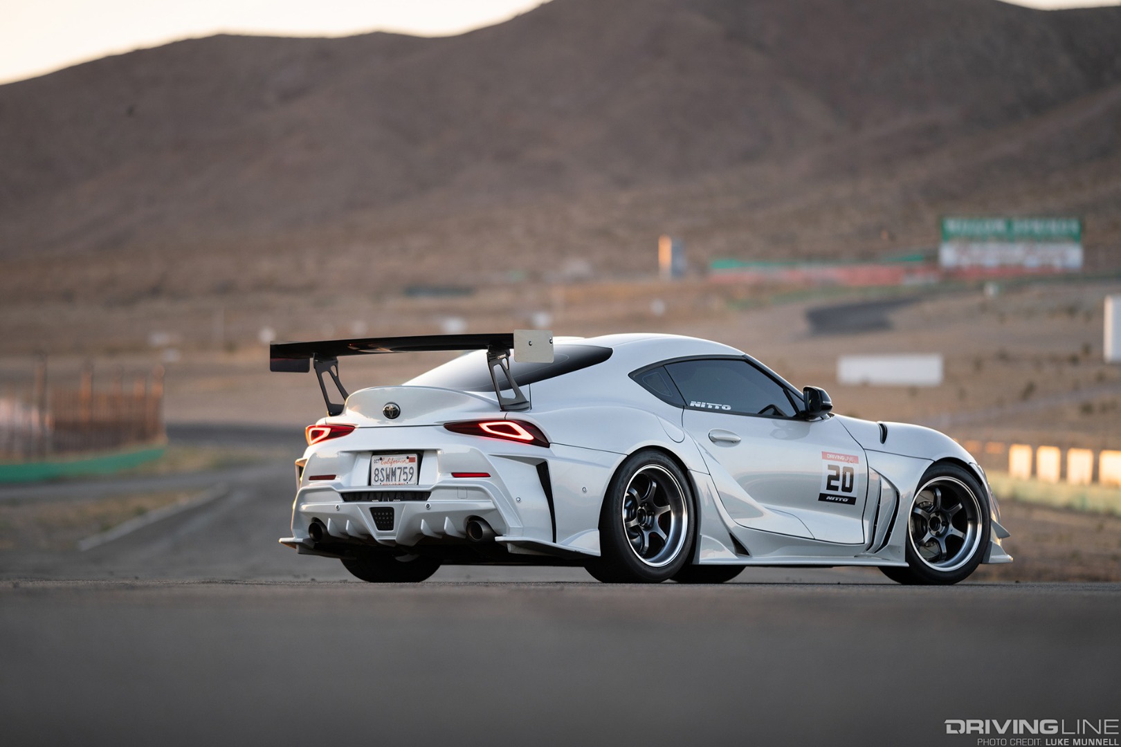 Toyota Supra on Nittos on track