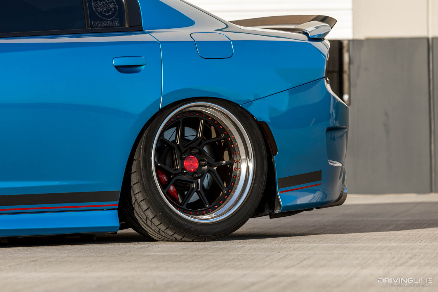 Nitto NT555 G2 Tires on the rear of a 2015 Dodge Charger SRT 392