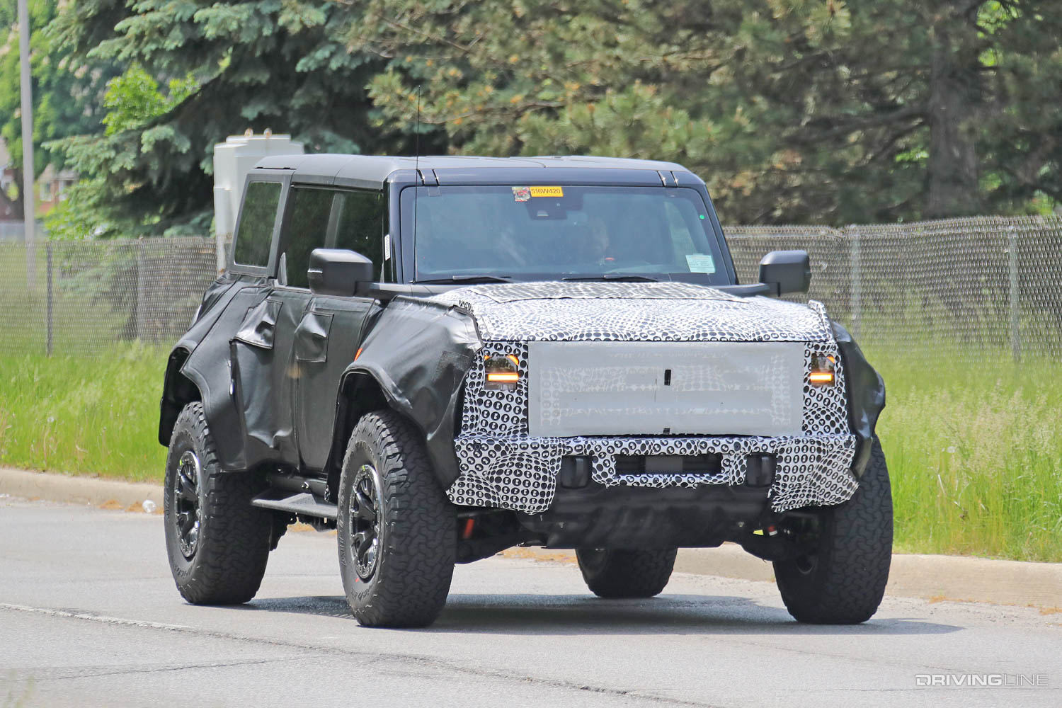 Spy Photos: New Ford Bronco Raptor front passenger side
