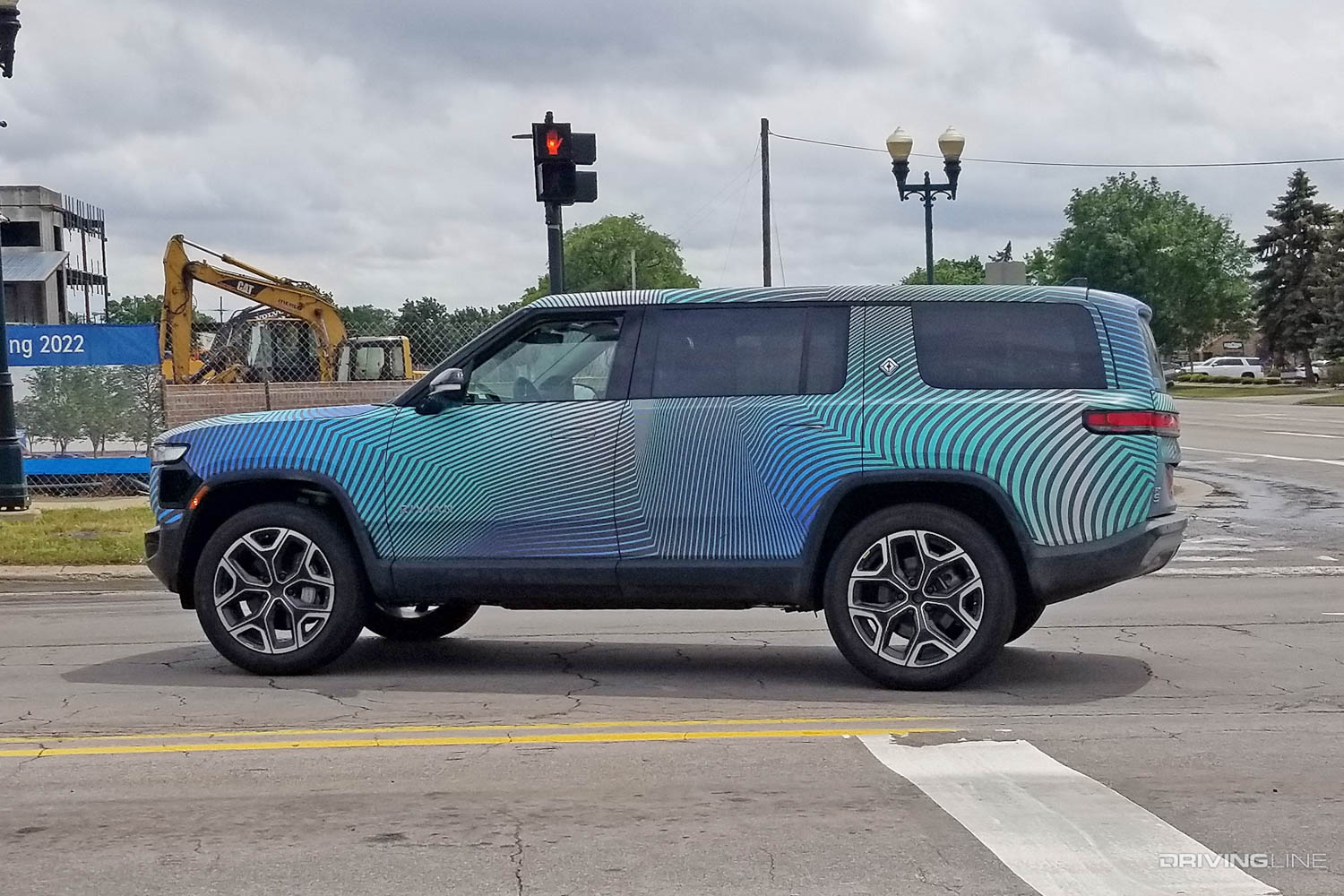 Rivian R1S Spy Photos validation testing side profile photo