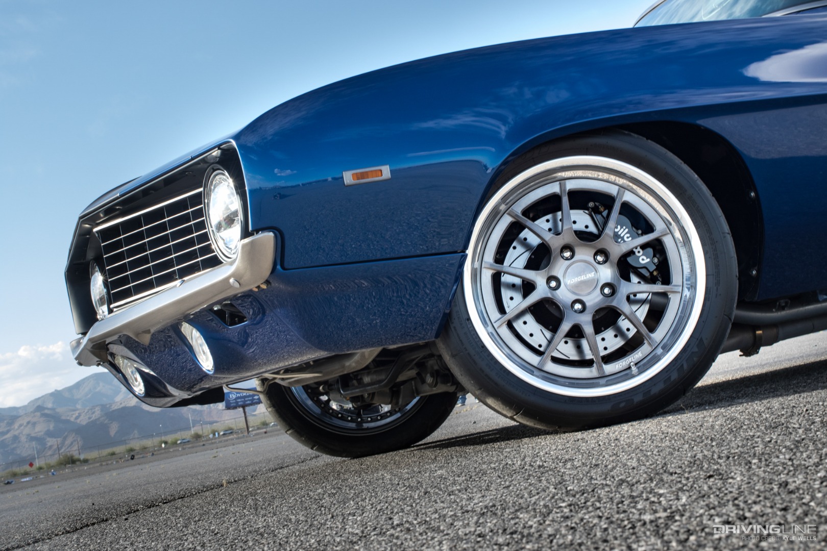 Chevrolet Camaro in blue on Nitto NT01 tires