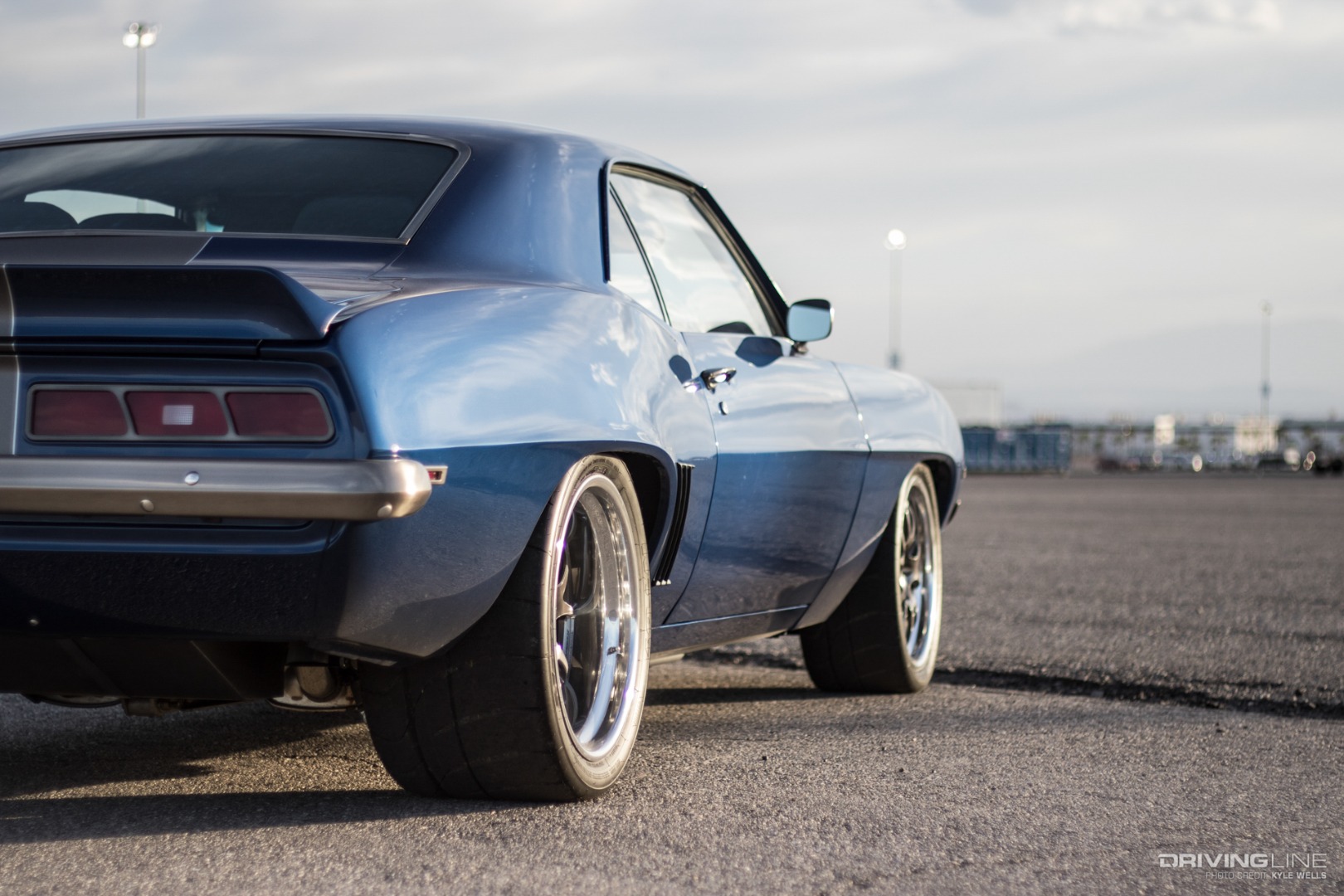 Chevrolet Camaro in blue on Nittos from rear