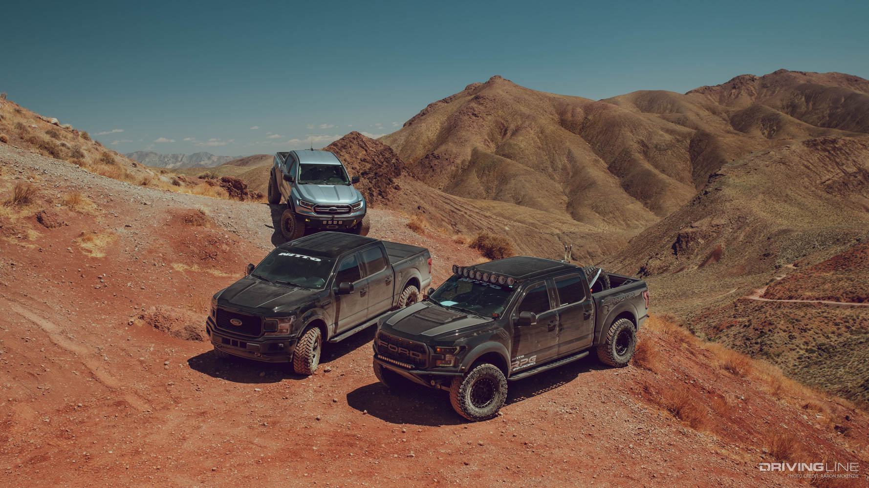 A Ford Ranger and two Ford F150 trucks in Driving Line's On The Trail Video Series